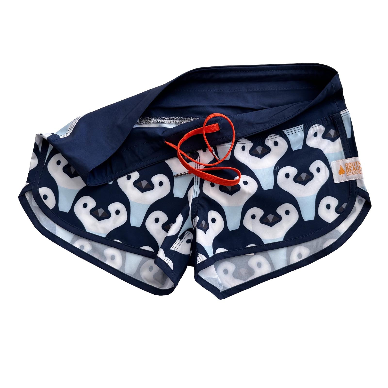 South Beach Boardies Cute butt Boardies in Penguin Parade, made from recycled plastic bottles, DRAWSTRING VIEW
