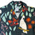 South Beach Boardies Men's Cubano Shirt made from Eucalyptus Tencel in Cocky print, close up of collar.