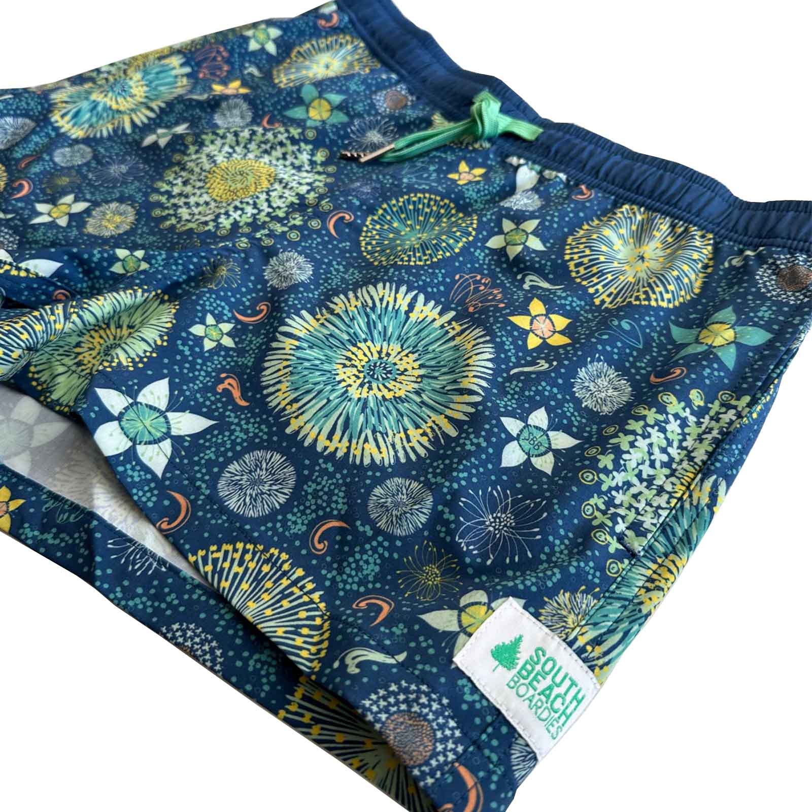 South Beach Boardies Women's Stretchy Shorts in In Bloom, made from recycled plastic bottles, side angle view