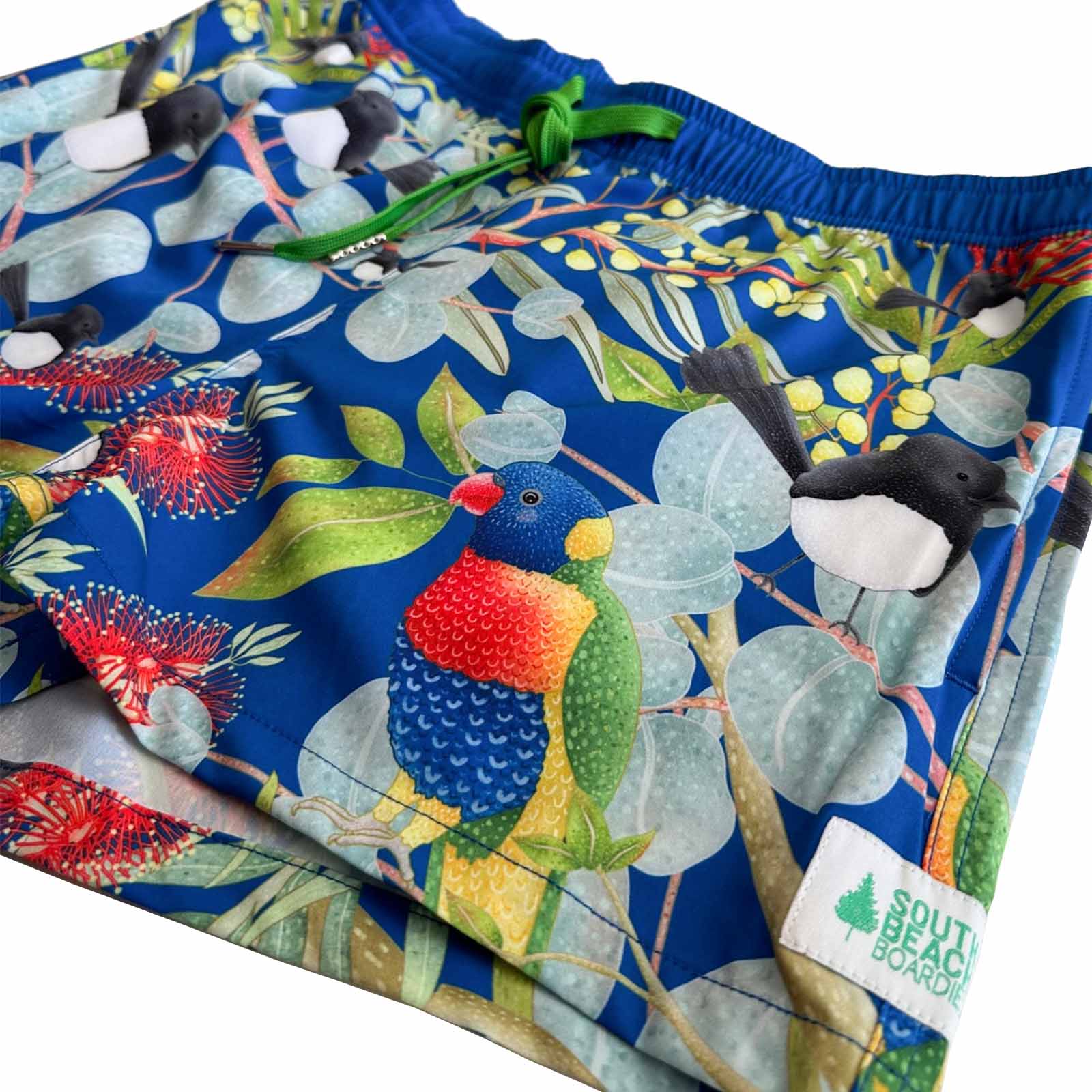 South Beach Boardies Women's Stretchy Shorts made by South Beach Boardies from recycled plastic bottles, Djiti Djiti Willy Wagtail fundraiser print, side angle view