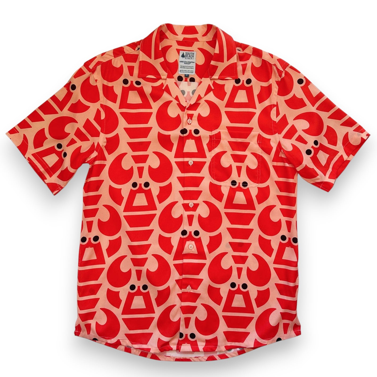 Red patterned lobster short on a peach background