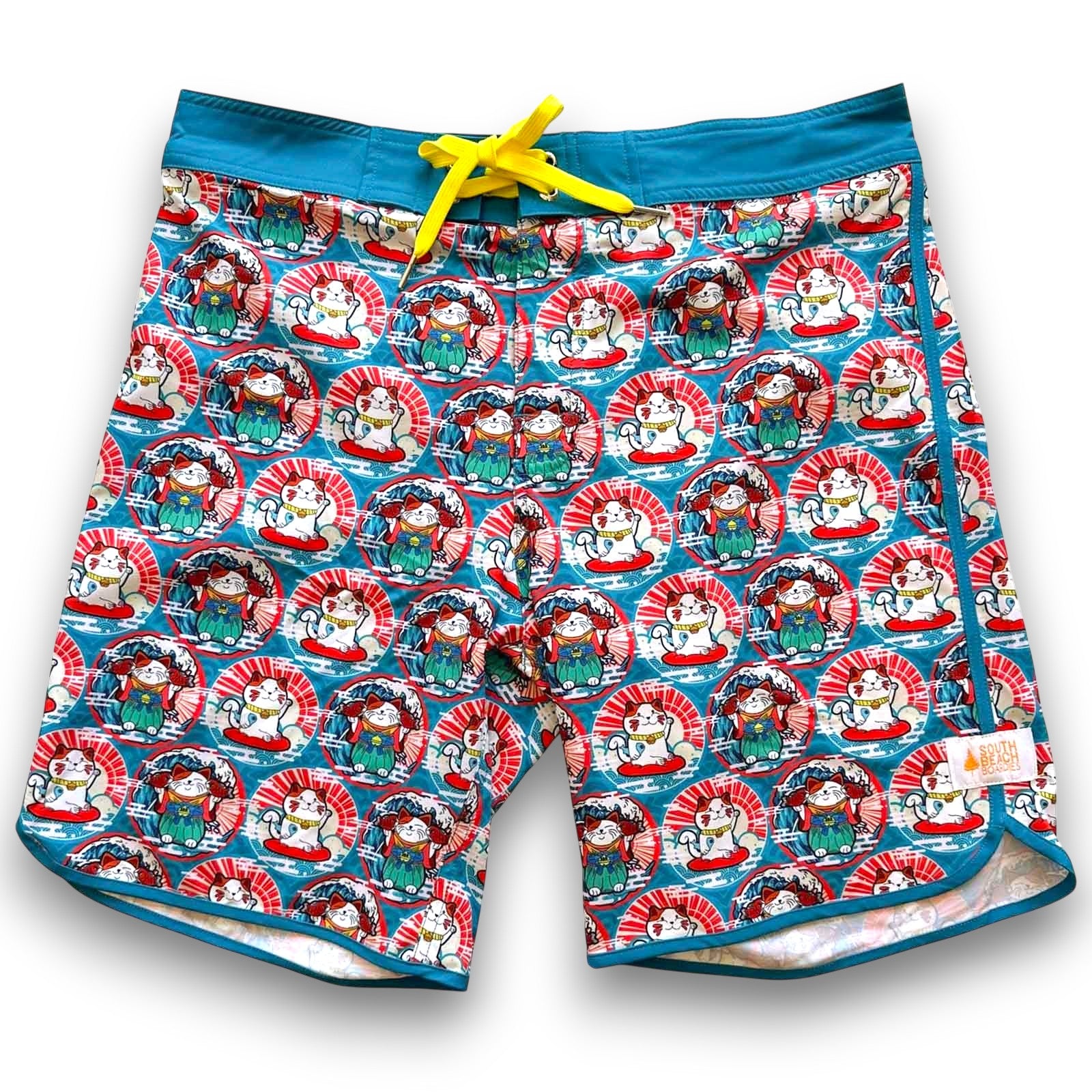 Colorful swim shorts with cartoon style Lucky Cat Maneki Neko pattern South Beach Boardies Mens Retro Piping boardies made from recycled plastic bottles, Maneki Neko front
view