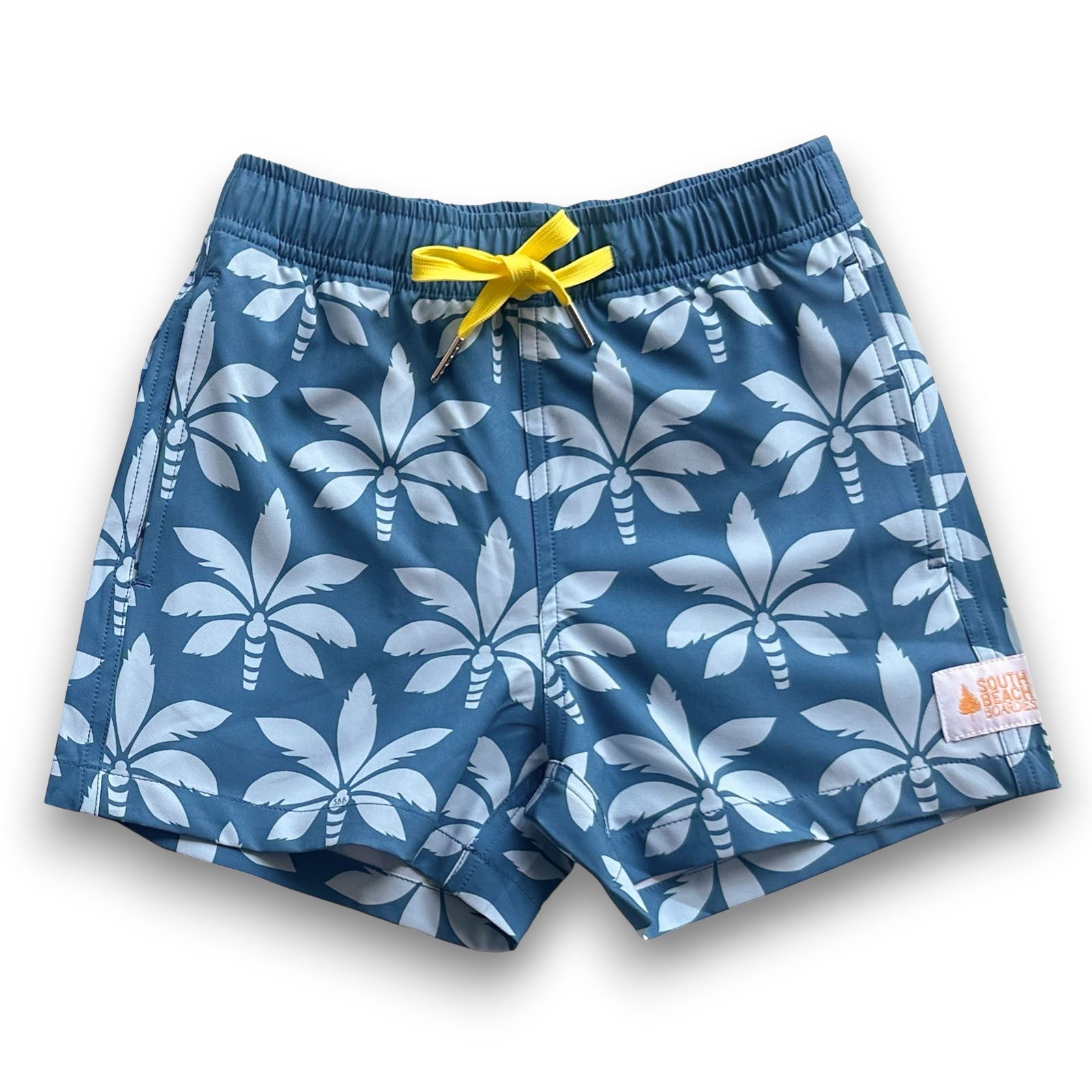South Beach Boardies Kids Stretchy Trunks made from recycled plastic bottles, Vintage Palms print, front view, yellow drawstring