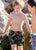 Eco-friendly South Beach Boardies Kids Stretchy Trunks in Cammoflock made from recycled plastic bottles designed in Western Australia, worn by boy at Fremantle Beach
