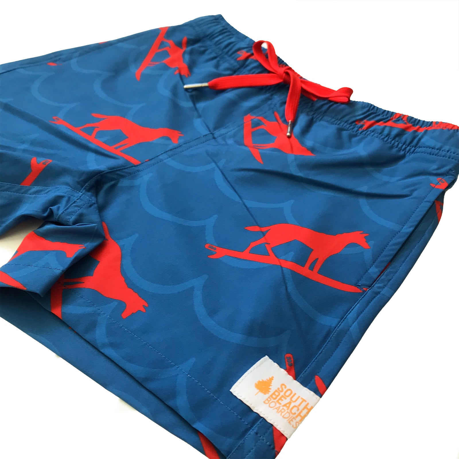 Kids Stretchy Trunks Dingo Took My Boardies 3.0 Wavy, made from recycled plastic bottles by South Beach Boardies. close up side view