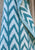 Bahari Turkish Towel with Pocket by Freostyle sustainable beach products, hung