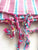 Our Berry Turkish Towel has beautiful hand-rolled tassels