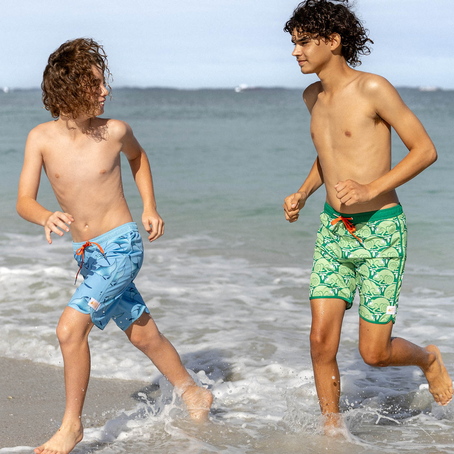 Kids playing at Fremantle West Australia beacj in Sustainable Piping Boardies made from Recycled Plastic Bottles by South Beach Boardies