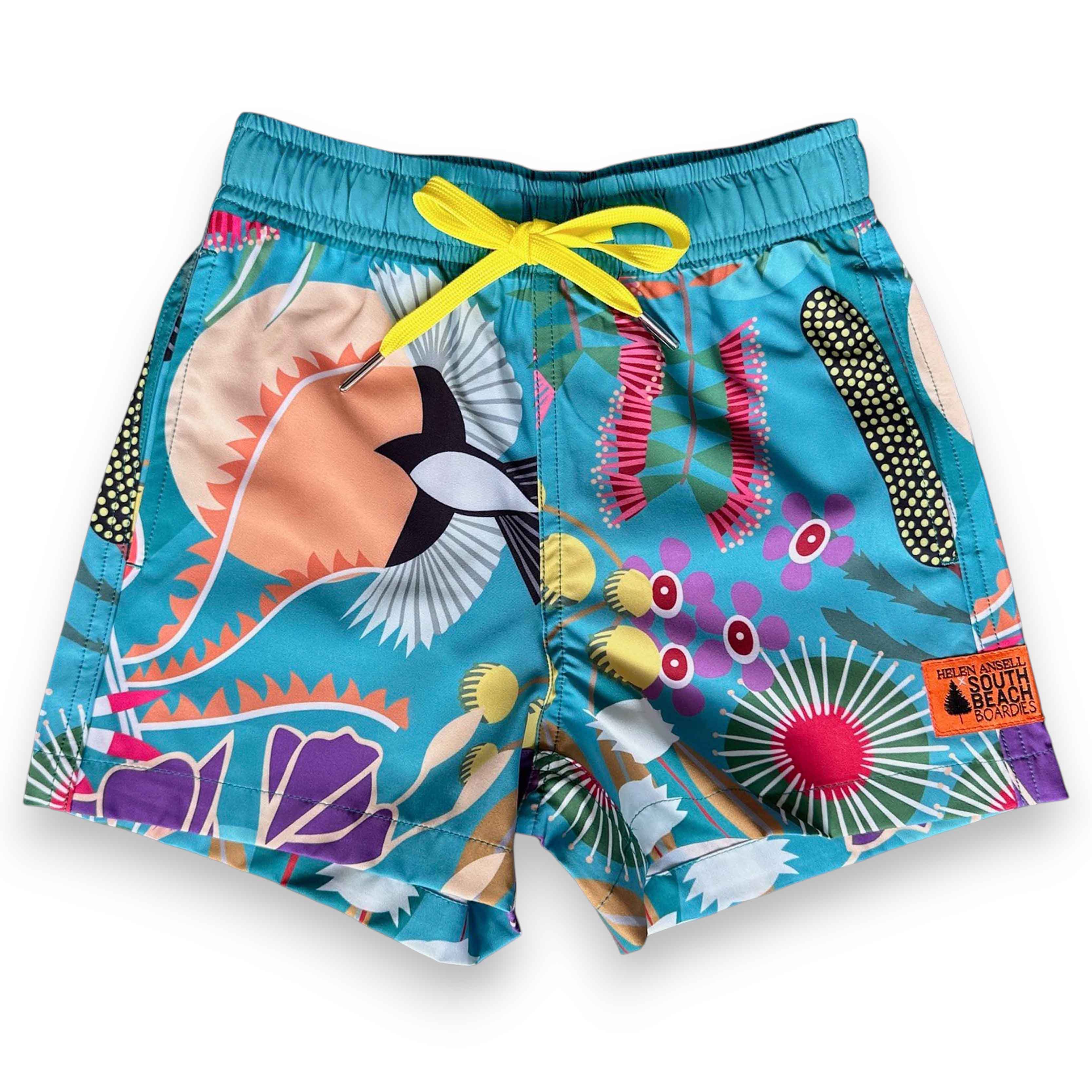 Colourful snd sustainable kids swim shorts with West Australian  flora and fauna designs, made from recycled plastic bottles from South Beach Boardies x Helen Ansell, front view