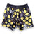 West Australian wattle patterned kids swim shorts with yellow flowers and grey leaves on a dark background, by South Beach Boardies x Helen Ansell, back view
