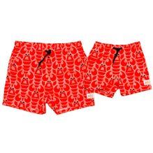 Matching Men's and Kids Stretchy Trunks made from recycled plastic bottles, Big Red Lobster print, from South Beach Boardies