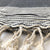 MIdnight black and cream turkish towel with handy pocket