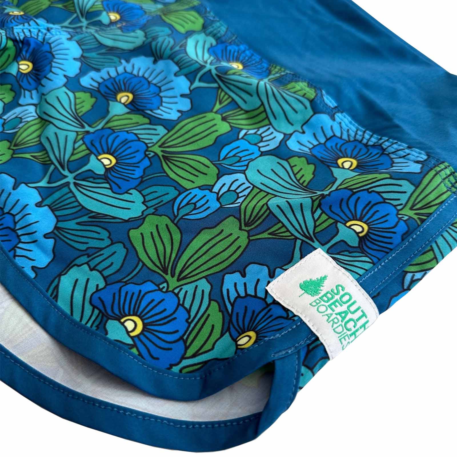 South Beach Boardies Cute butt Boardies in Blue Flowers, made from recycled plastic bottles, side angle view