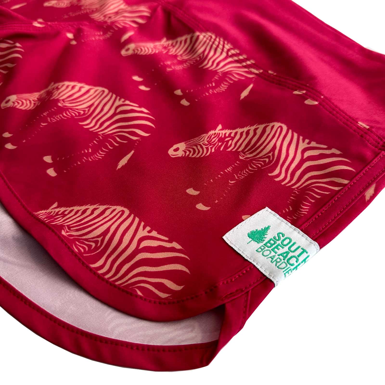 South Beach Boardies Cute butt Boardies in Pink Zebra, made from recycled plastic bottles, side angle view