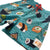 South Beach Boardies Kids Stretchy Trunks made from recycled plastic bottles, Sushi Sushi print, side legview.