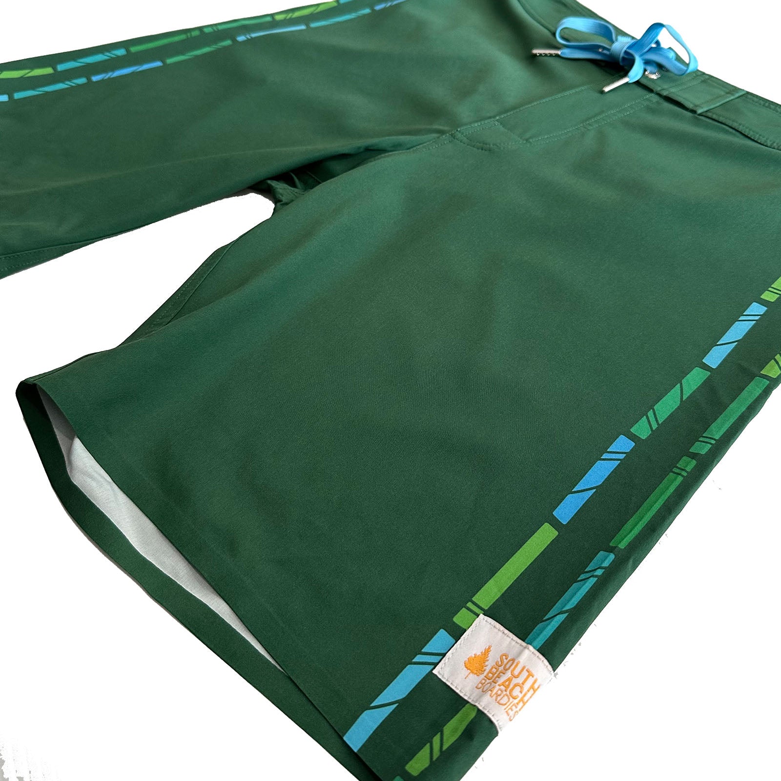 South Beach Boardies Mens Performance boardies made from recycled plastic bottles, Frond print, leg closeup