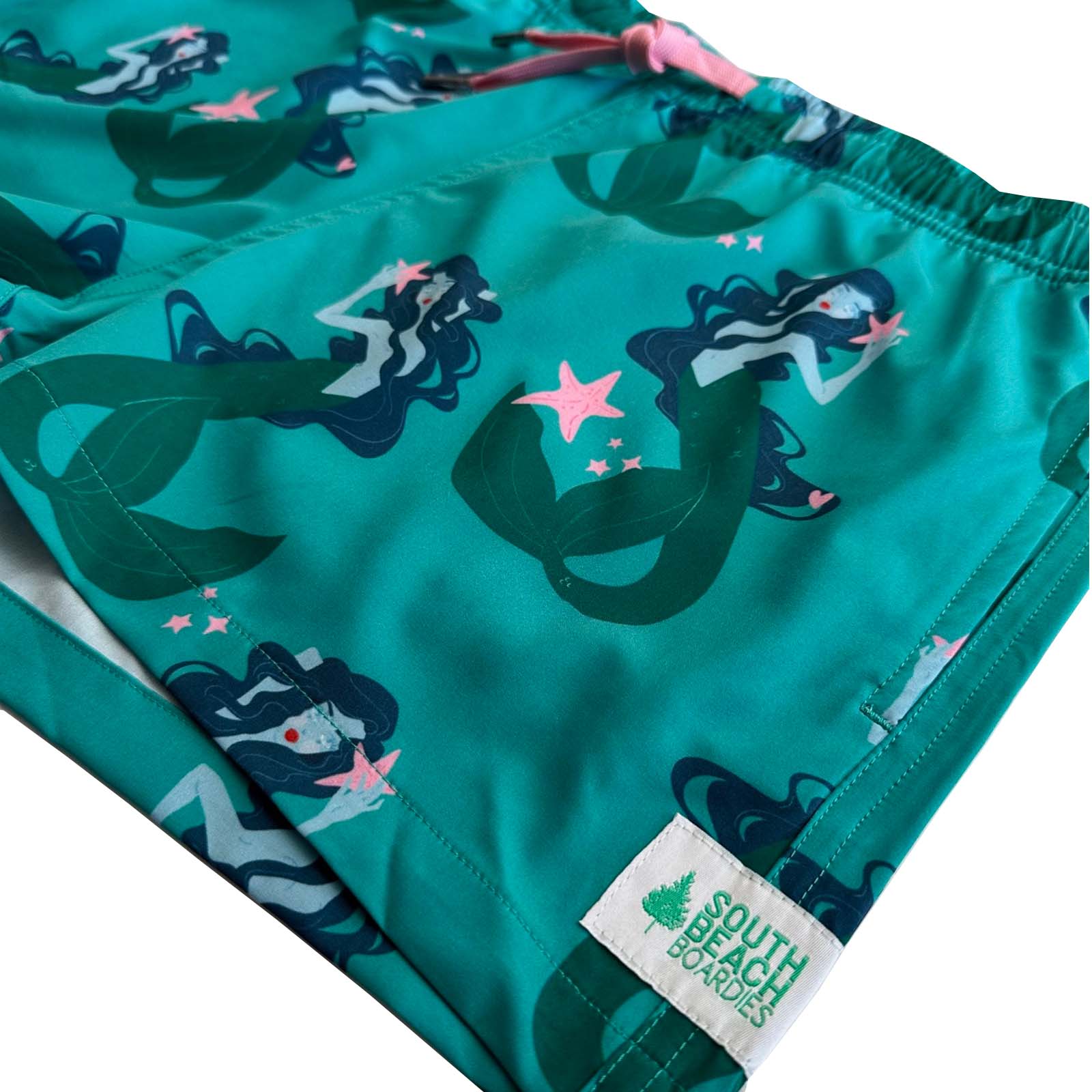 South Beach Boardies Women's Stretchy Shorts in Mermaid, made from recycled plastic bottles, side angle view