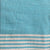 Azure authentic Turkish Towel features a pale turquoise and cream traditional weave across the main body of the towel, with alternating thin turquoise and cream stripes at each end