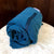 Freostyle Blue Angel indigo Turkish Towel with pocket, rolled