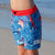 Girl wearing SBB Godzilla & Gang Going Out Boardies left side view