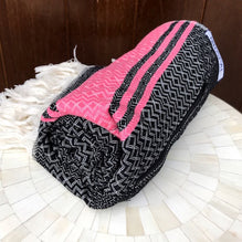 Pinky Turkish Towel rolls up so small, it's the perfect towel to take to the beach!