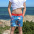 Girl wearing South Beach Boardies Kids Going Out Boardies recycled plastic Godzilla front view