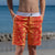 Girl wearing SBB Kids Going Out Boardies recycled Orange Crush, side pocket view