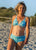 South Beach Boardies Women's Pelican Briefs Vintage Bikini, made from recycled plastic bottles. walking on South Beach Dog Beach.