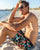SouthBeachBoardies recycled sustainable Mens Surfer Boardies in Mosaic, sitting on South Beach Dog Beach