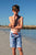 Boy wearing South Beach Boadies from recycled plastic. Kids Long Boardies in Sea Punk