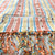 Sunset Stripe: stunning turkish towel with handy pocket, in orange, yellow and blue woven stripes