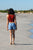 Womens Summer Shorts in My Favourite Mermaid, walking along beach